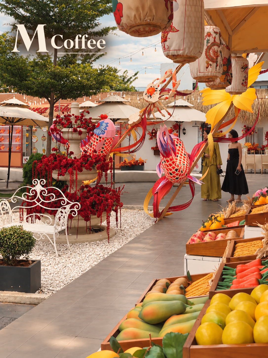 Giant carp lanterns, painted lanterns and a flower fountain in the outdoor courtyard of M Coffee, Da Nang, decorated for Mid-Autumn