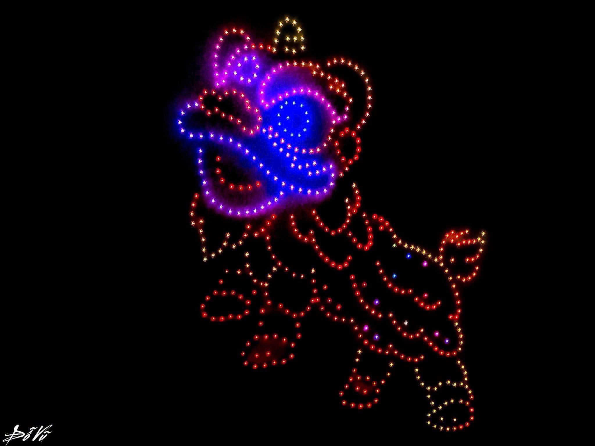 500 drones forming a glowing lion dance head over Hoi An Central Park on Mid-Autumn night 2026