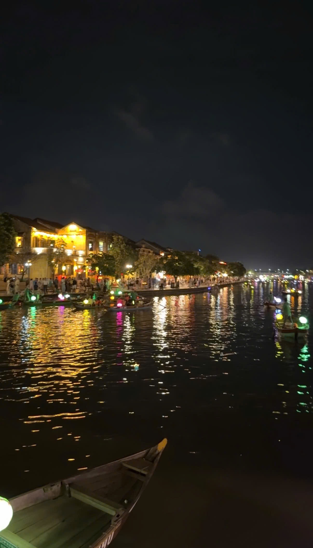 Lights of the Hoi An Ancient Town reflected in the Thu Bon River on Mid-Autumn night