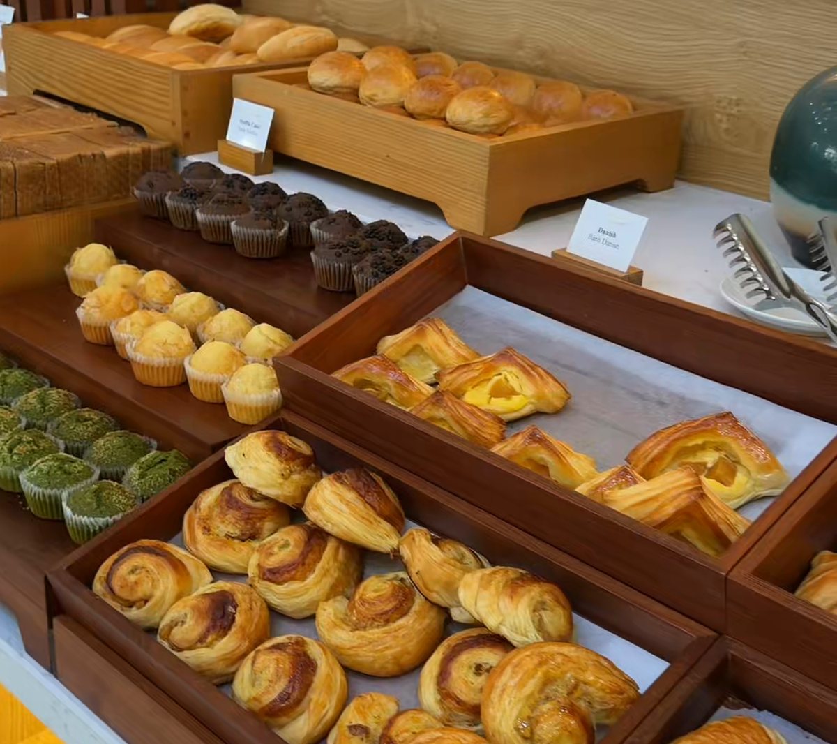 Trays of croissants, buns and pastries on the breakfast buffet at An Bistro, Hoi An Memories Land