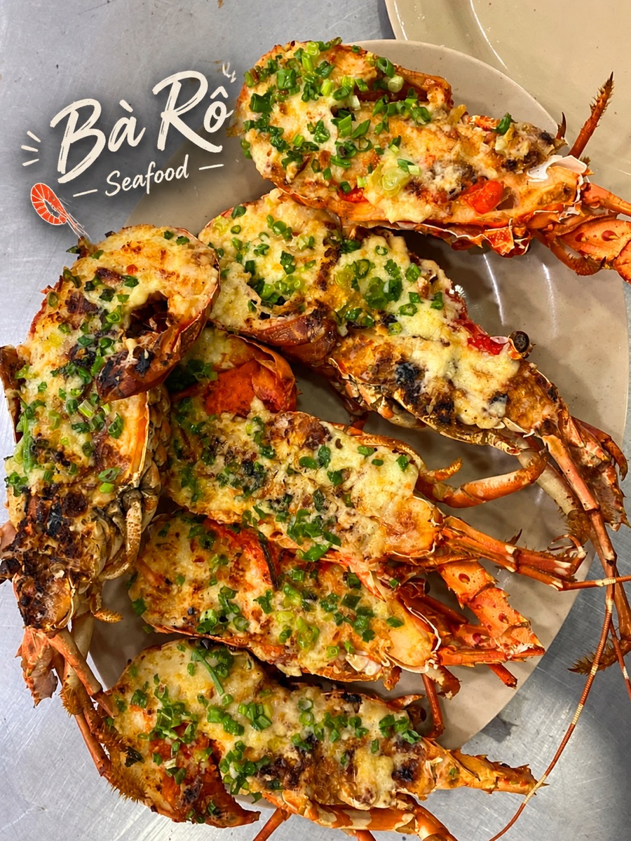 Grilled lobster topped with scallion oil and cheese at Bà Rô Seafood in Da Nang