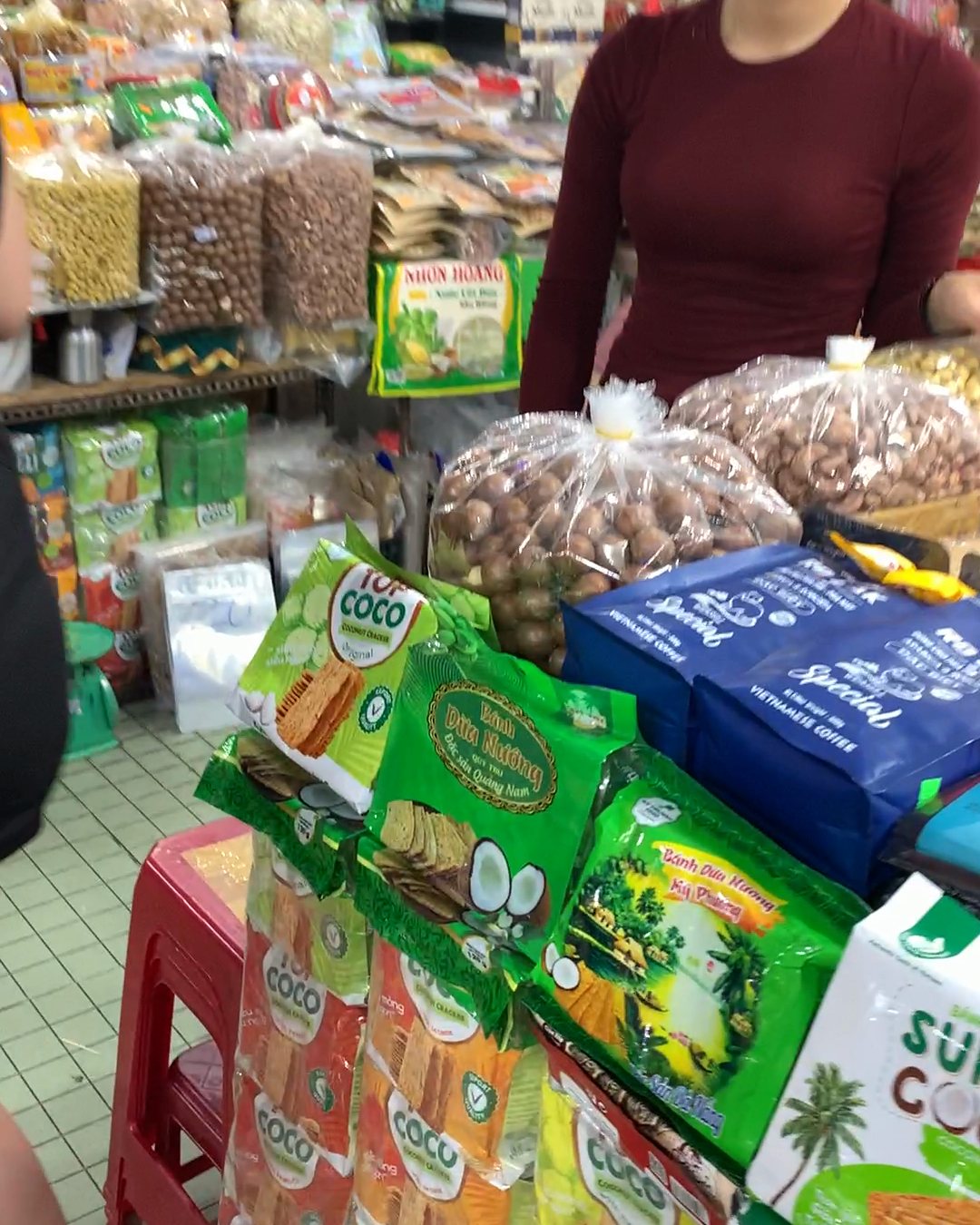 Coconut candy and dried snacks for sale at Han Market Da Nang