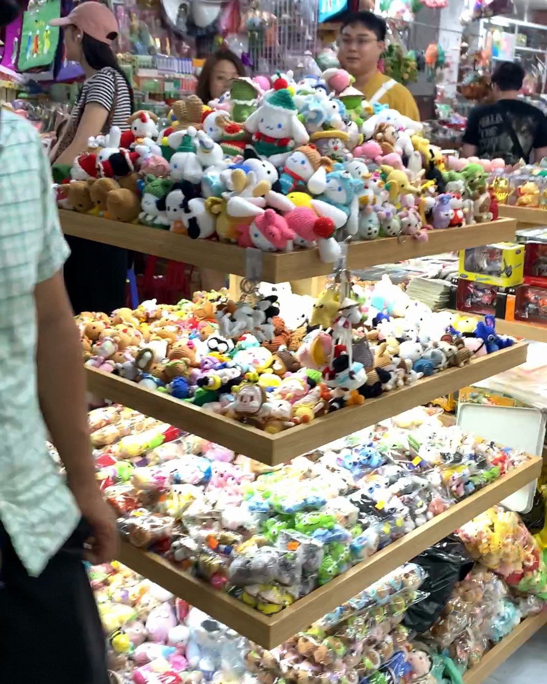 Plush toys and souvenirs at a stall in Han Market
