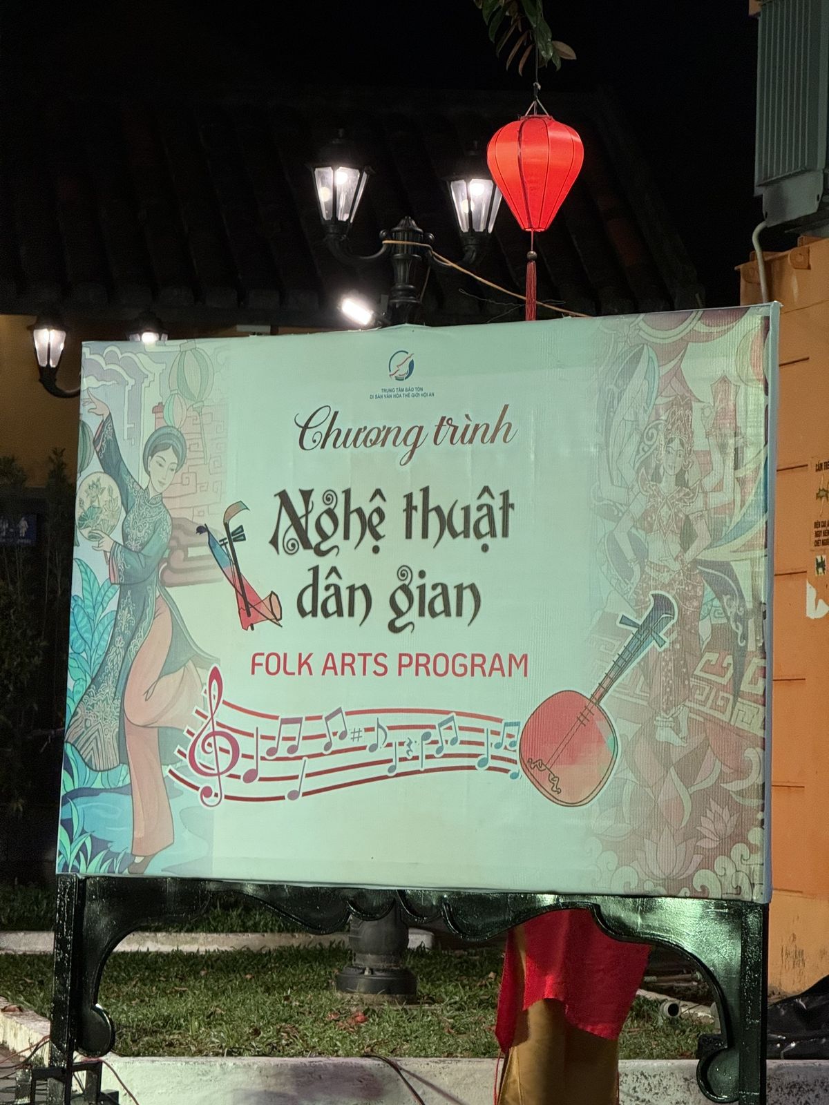 Sign for the Folk Arts Program (Chuong trinh Nghe thuat dan gian) at Kazik Park, Hoi An Ancient Town