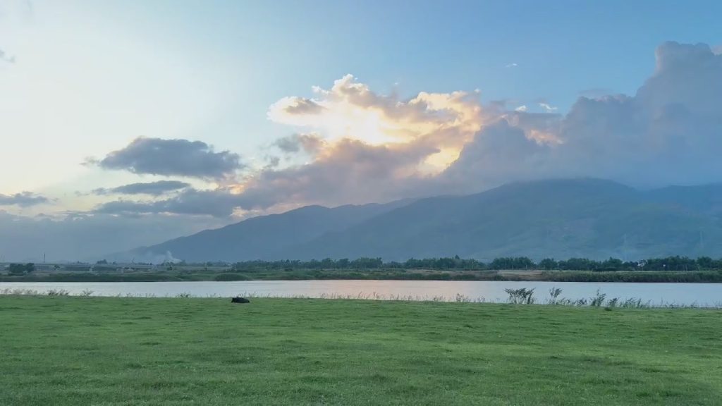 Pink sunset clouds over Khe Tân Lake