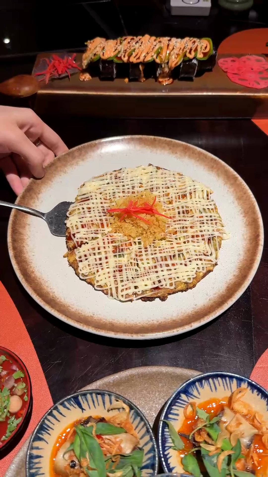 Japanese-style bánh xèo (bánh xèo Nhật) with sauce lattice at Maha Vegetariano