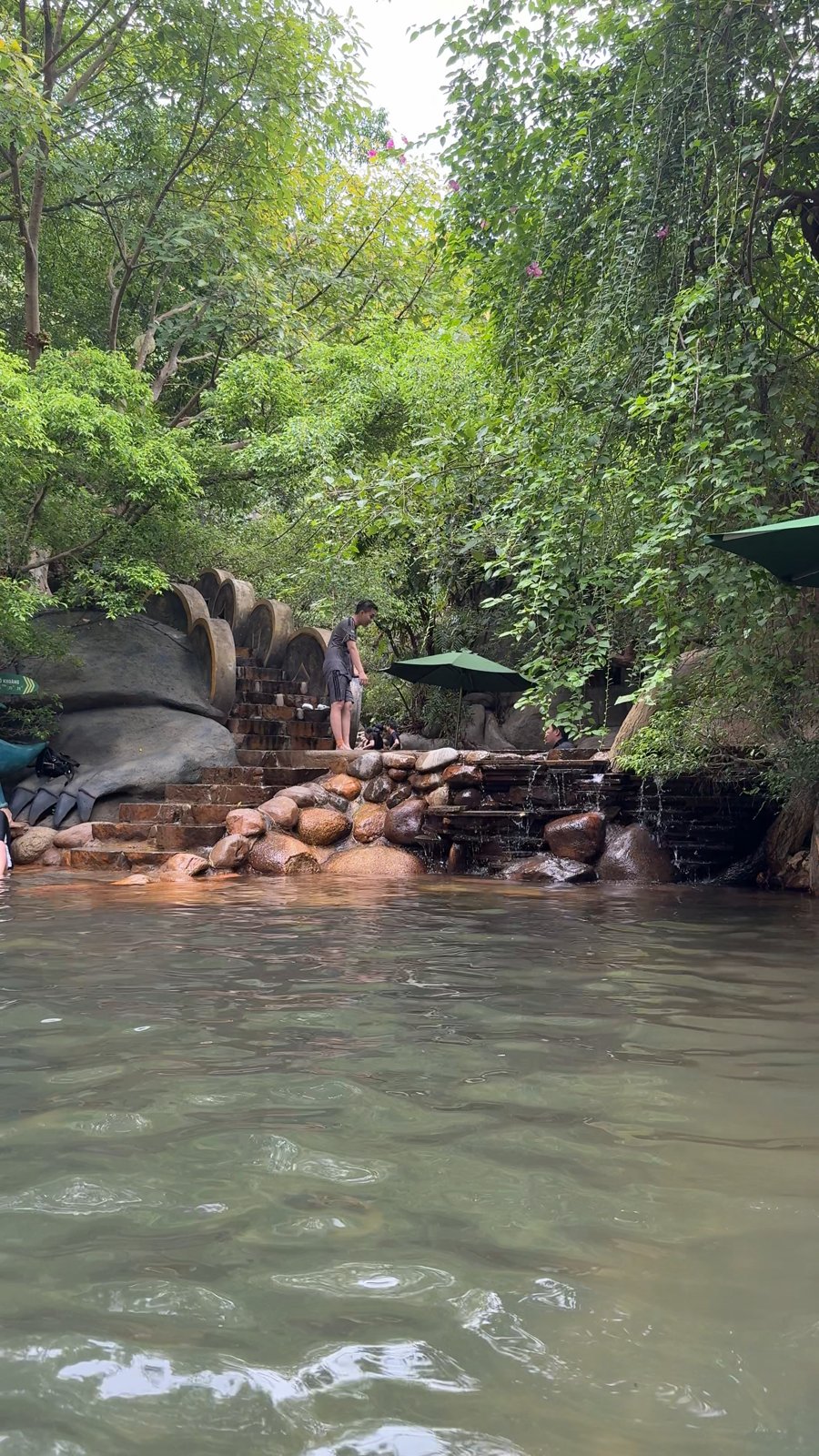 Natural mineral hot spring stream in the forest at Núi Thần Tài, Da Nang