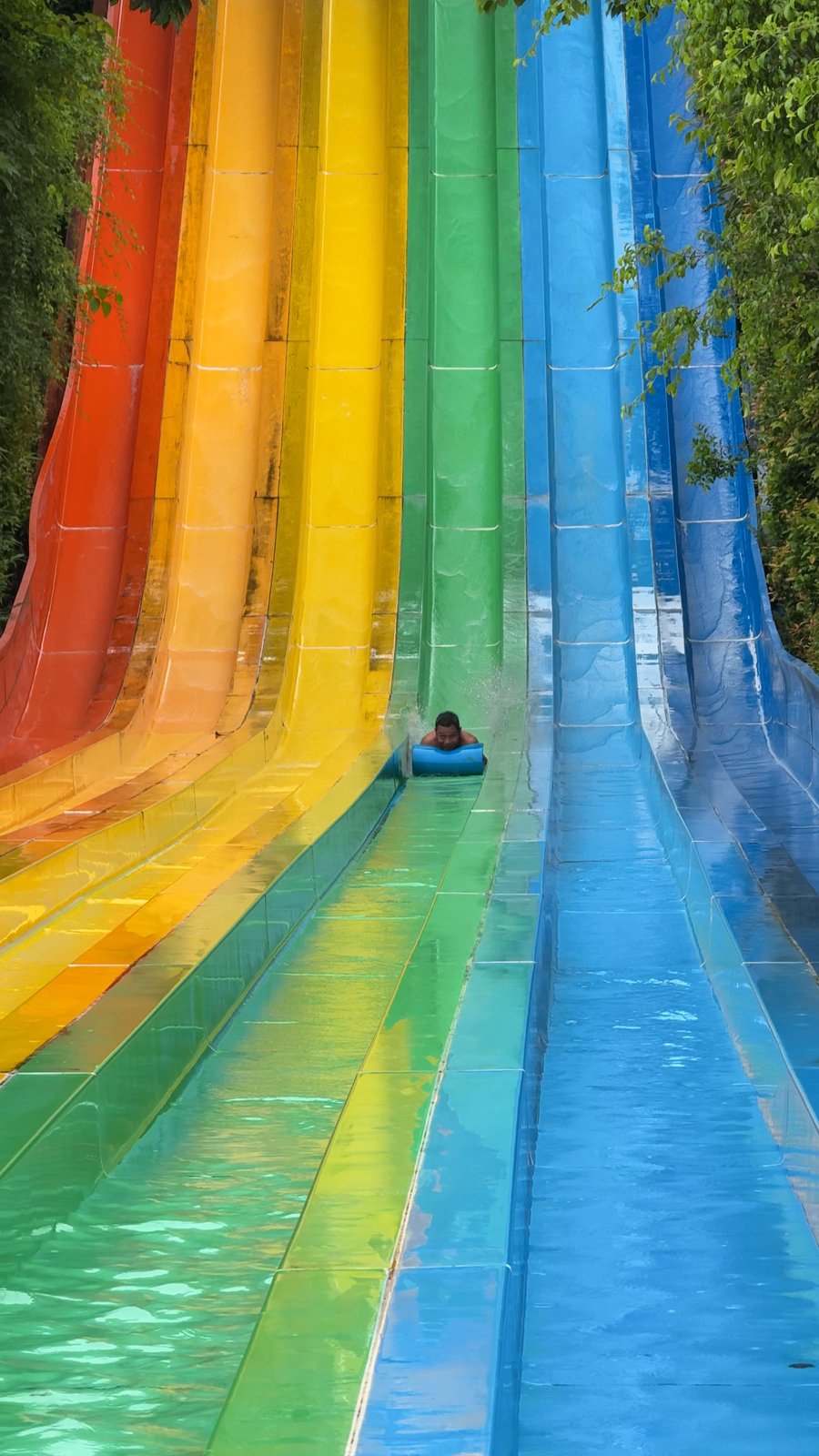 Rainbow racing slides at the Núi Thần Tài water park in Da Nang
