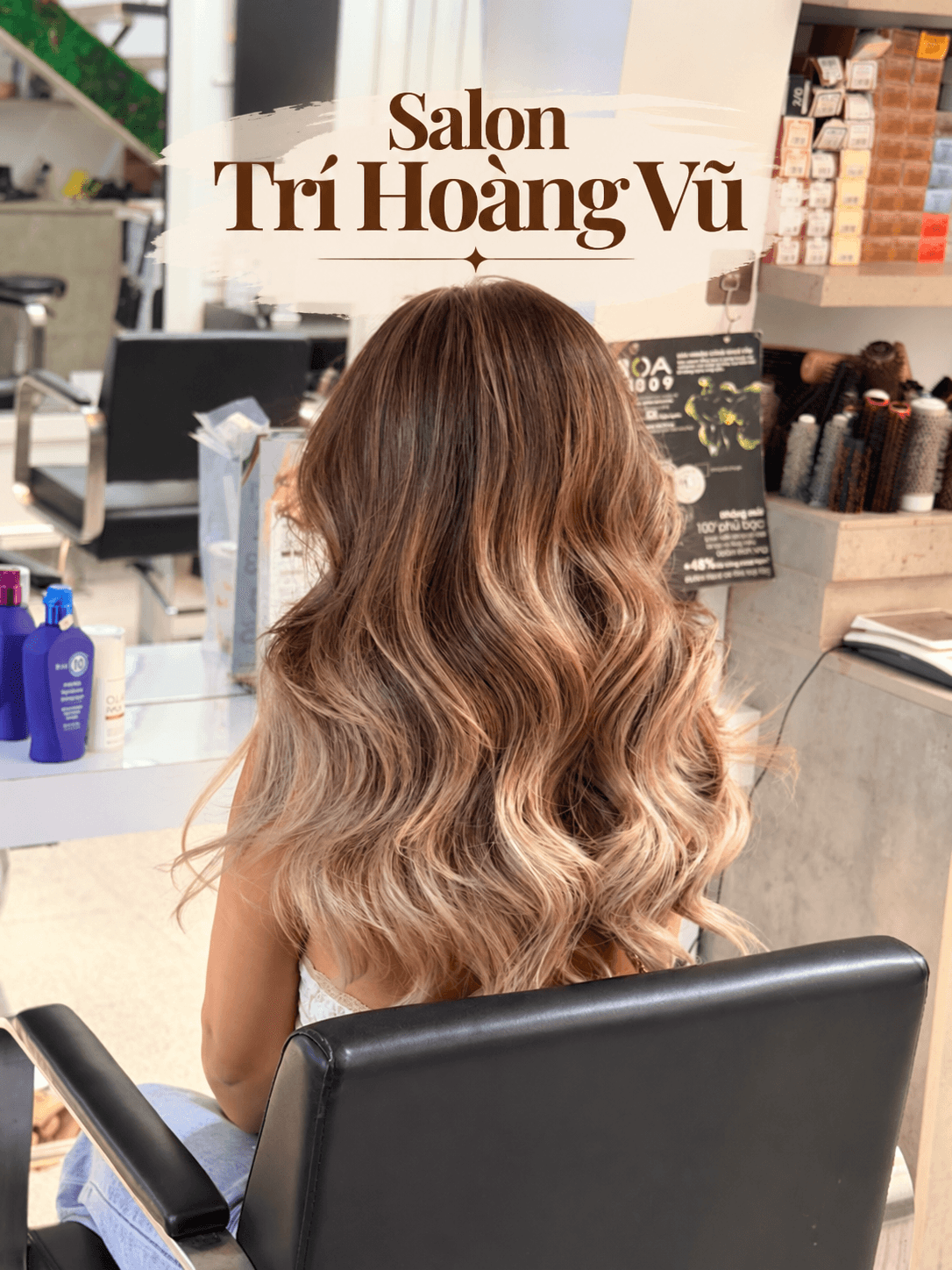 Long wavy hair with a honey-blonde balayage at Salon Trí Hoàng Vũ in Da Nang