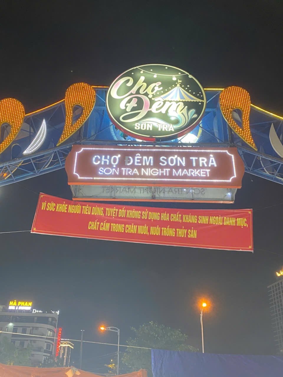 The entrance gate of Son Tra Night Market (Chợ đêm Sơn Trà) in Da Nang at night