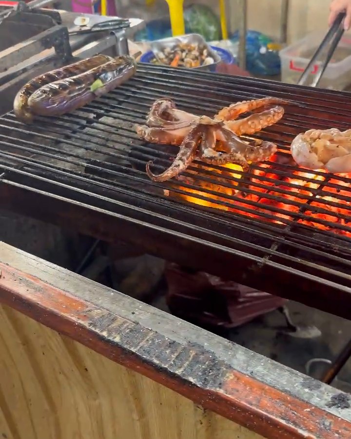 Seafood and squid on a charcoal grill at Son Tra Night Market