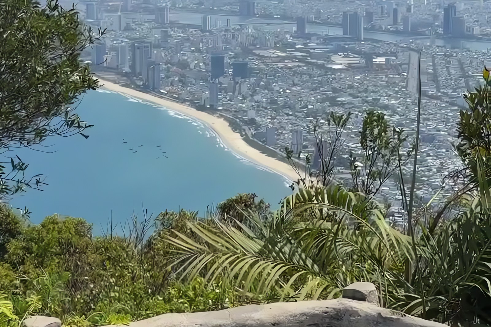 View from Son Tra Peninsula over the curved beach and Da Nang city